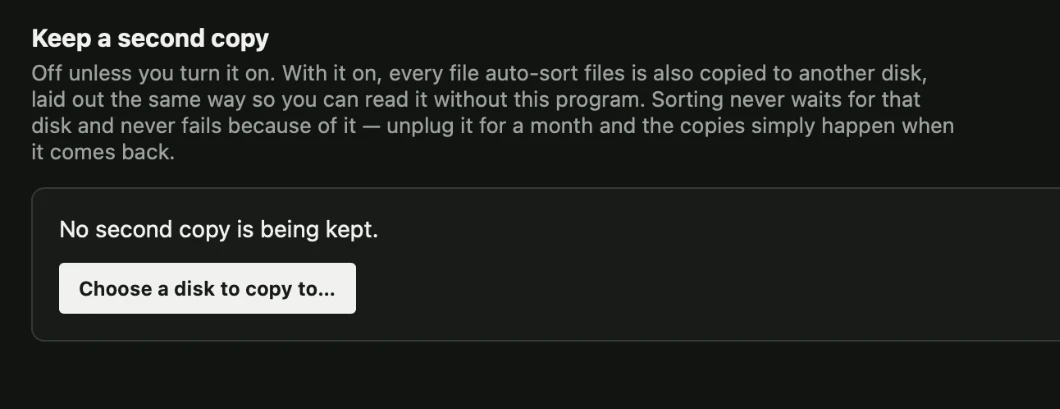 The backup panel on the log page: off by default, one button to choose a disk, and a sentence explaining that sorting never waits on it.